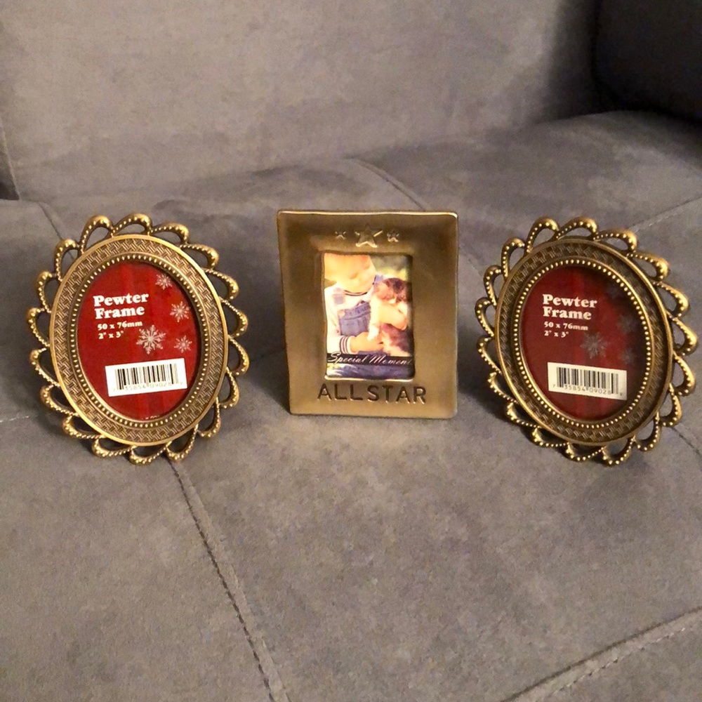 Pewter picture frames.